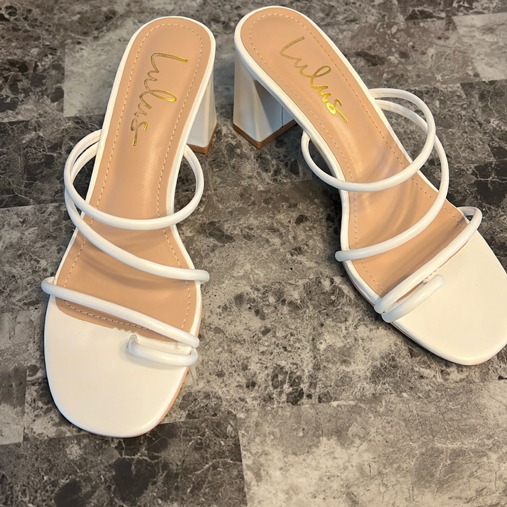 Lulu’s white strappy heels